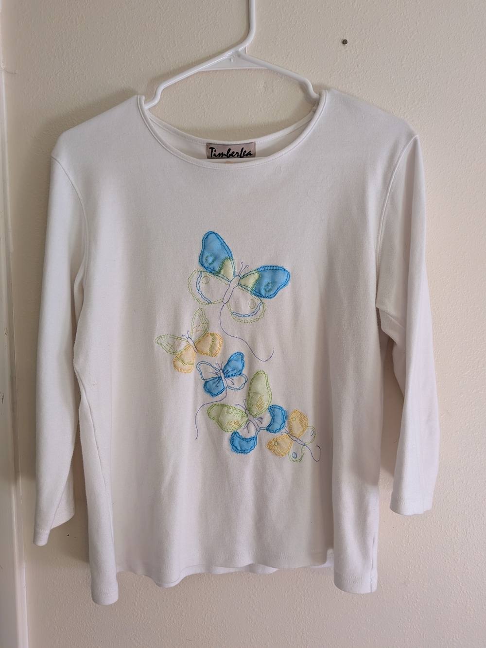 Timberlee White Long-Sleeve Tee with Blue & Yellow Butterfly Embroidery